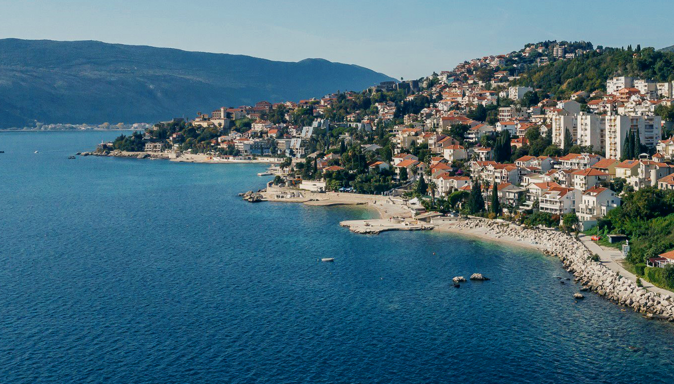 Aerial view of Djenovici and the northern Bay of Kotor shoreline, Montenegro