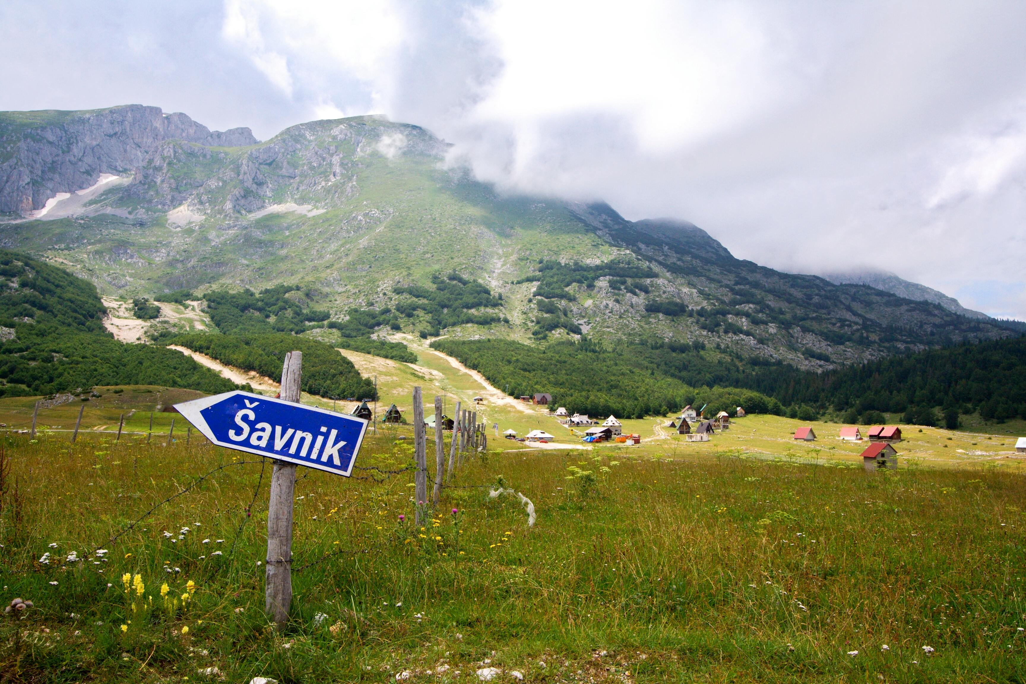 Signpost on a hiking trail in the Durmitor mountain valley near Žabljak, Montenegro