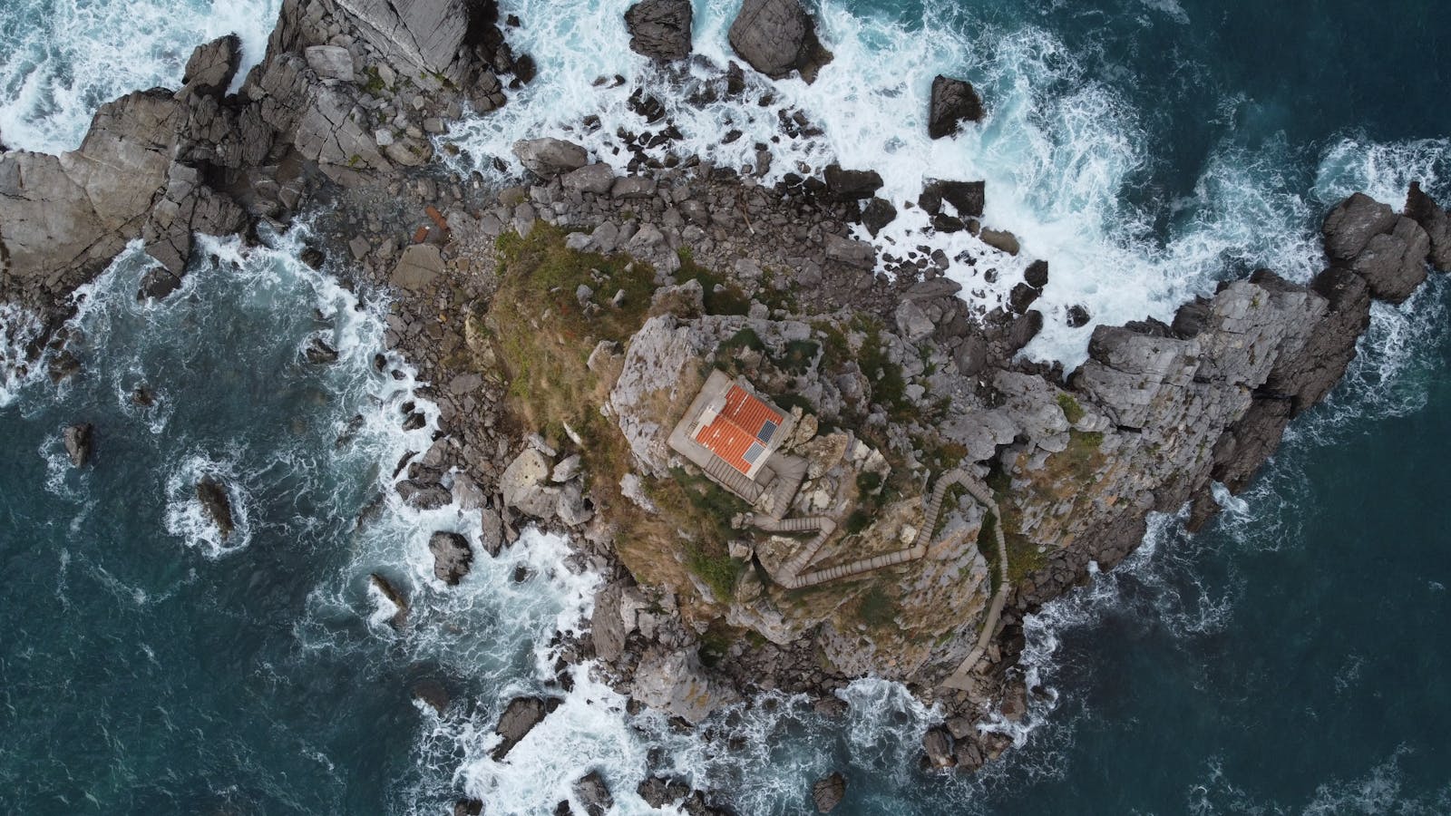 Aerial view of Sveta Nedjelja and Katič islets off Petrovac, Montenegro