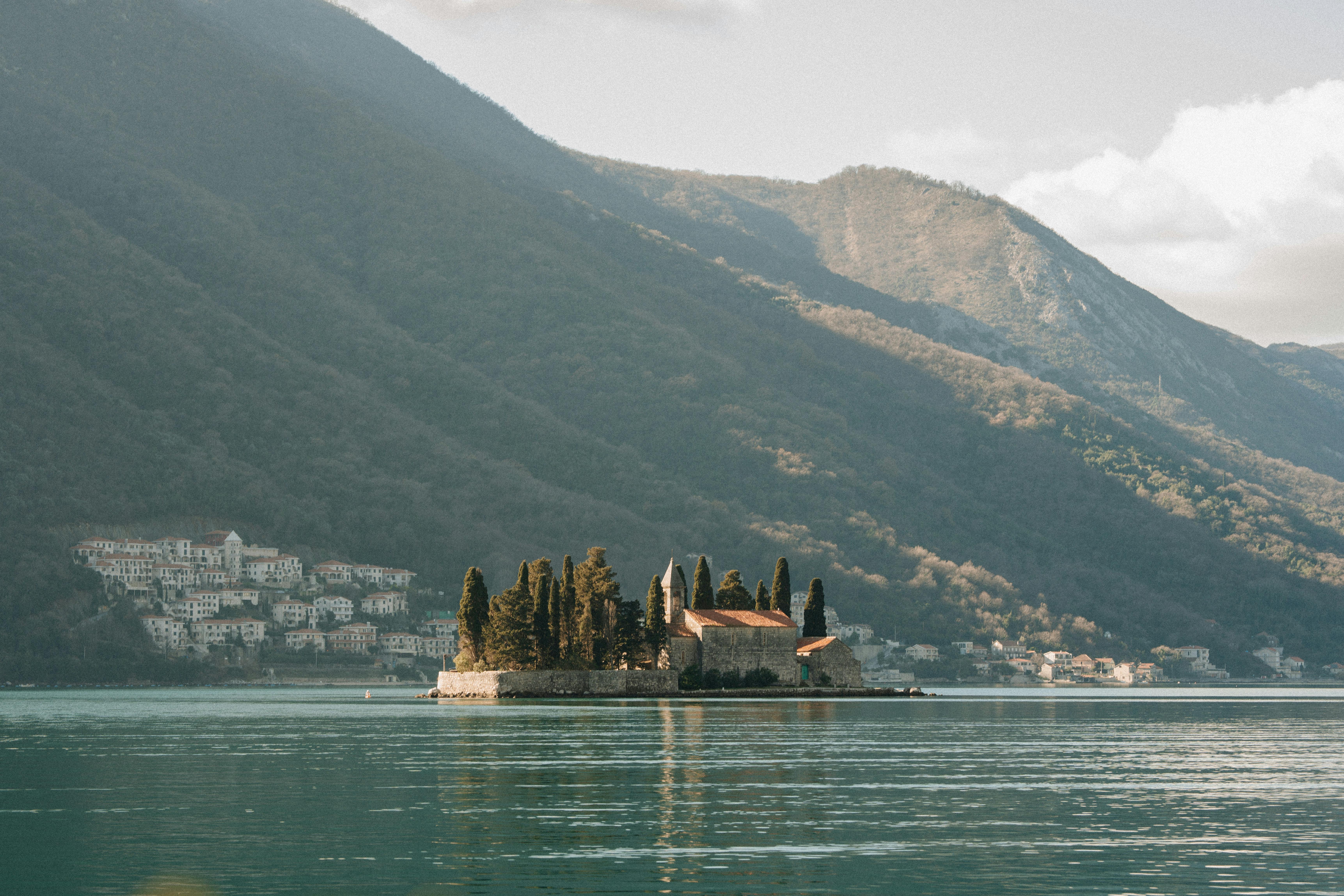 St George Island in the Bay of Kotor seen from Perast, with the village visible on the far shore